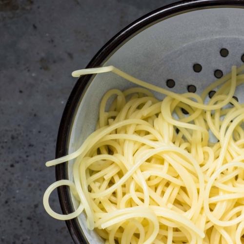 Why You Should Never Throw Pasta Water Down The Drain