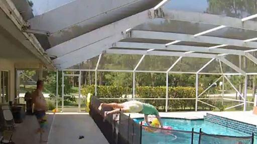 Heroic Dad Dives Over Fence to Rescue Toddler in Pool