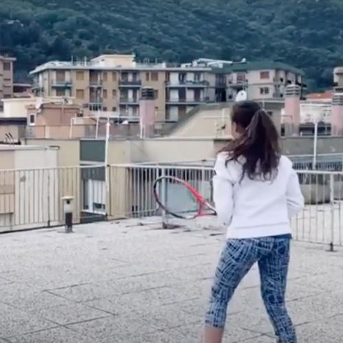 Two Women Play Rooftop Tennis During Quarantine